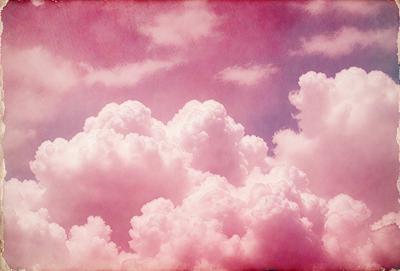 The primary subject of the image is a pink cloud in the sky. The setting is a cloudy sky, and the visual style appears to be a painting or drawing. The colors and mood of the image are predominantly pink, creating a warm and inviting atmosphere.