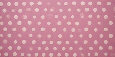 The primary subject of the image is a pattern of white dots on a pink background. The dots are arranged in a circular pattern, creating a visually appealing and cohesive design. The setting is a pink surface, which serves as the background for the dots. The visual style of the image is a combination of digital art and illustration, as the dots are created using a digital medium. The colors and mood of the image are predominantly pink and warm, giving the scene a sense of warm