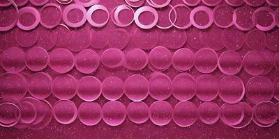 The primary subject of the image is a large pink surface with a pattern of circles. The circles are arranged in a way that creates a visually appealing and cohesive design. The setting is a pink background, which complements the circles and adds to the overall aesthetic of the image. The visual style is a combination of digital art and illustration, as the circles are created with a digital tool, and the overall design is well-executed and visually pleasing. The colors and mood of the image