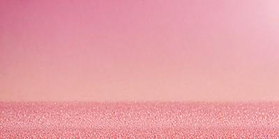 The primary subject of the image is a pink background. The setting is a flat, pink surface, which appears to be a wall or a table. The visual style of the image is a photo, showcasing the pink background. The colors and mood of the image are predominantly pink, creating a warm and inviting atmosphere.