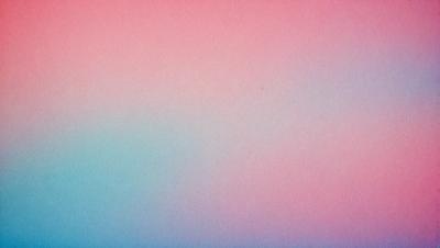 The primary subject of the image is a large, blank sheet of paper. The setting is a room with a pink background. The visual style is a close-up of the paper, showcasing its texture and color. The colors and mood of the image are predominantly pink, creating a warm and inviting atmosphere.