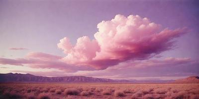 The primary subject of the image is a large, pink cloud in the sky. The cloud is surrounded by a beautiful mountain range, creating a picturesque scene. The visual style of the image is a combination of photo and digital art, as it captures the natural beauty of the landscape and the cloud. The colors and mood of the image are predominantly pink and purple, giving it a serene and calming atmosphere.