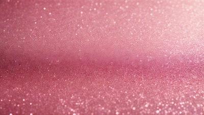 The primary subject of the image is a pink surface with a glittery texture. The setting is a pink background, and the visual style appears to be a photo. The colors and mood of the image are predominantly pink, creating a warm and inviting atmosphere.