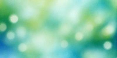 The primary subject of the image is a blue and green background with a few white specks. The setting is a bright and colorful sky, which creates a vibrant and lively atmosphere. The visual style is a mix of digital art and illustration, giving the image a unique and artistic appearance. The colors and mood of the image are predominantly blue, green, and white, with a hint of brightness and energy.