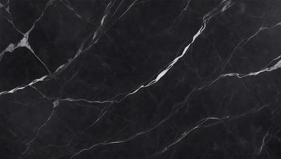 The primary subject of the image is a close-up of a marble countertop. The setting is a kitchen, with the countertop being the main focus of the scene. The visual style is a photo, capturing the intricate details of the marble surface. The colors and mood of the image are predominantly black and white, giving it a classic and elegant appearance.