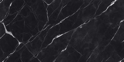 The primary subject of the image is a black marble countertop. The setting is a kitchen, with the countertop being the main focus of the scene. The visual style is a close-up of the marble countertop, showcasing its texture and pattern. The colors and mood of the image are predominantly dark, with the black marble countertop being the main source of contrast.