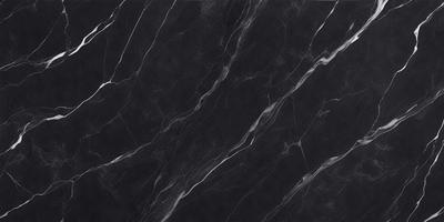 The primary subject of the image is a black marble countertop. The setting is a kitchen, with the countertop being the main focus of the scene. The visual style is a close-up of the marble countertop, showcasing its texture and pattern. The colors and mood of the image are predominantly dark, with the black marble countertop being the main source of contrast.