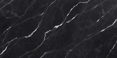 The primary subject of the image is a black marble countertop. The setting is a kitchen, with the countertop being the main focus of the scene. The visual style is a close-up of the marble countertop, showcasing its texture and pattern. The colors and mood of the image are predominantly dark, with the black marble countertop being the main source of contrast.