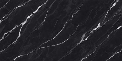 The primary subject of the image is a black marble countertop. The setting is a kitchen, with the countertop being the main focus of the scene. The visual style is a close-up of the marble countertop, showcasing its texture and pattern. The colors and mood of the image are predominantly dark, with the black marble countertop being the main source of contrast.