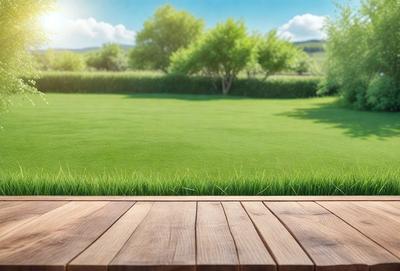 The primary subject of the image is a wooden deck with a grassy field in the background. The setting is a lush green field, and the visual style is a photo. The colors and mood of the image are predominantly green, creating a serene and natural atmosphere.