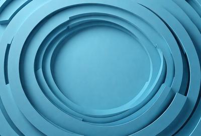 The primary subject of the image is a blue circle, which is the main object, scene, or focus of the image. The setting/background is a blue surface, which could be a wall or a background. The visual style of the image is digital art, as it is a digital representation of a circle. The dominant colors in the image are blue, which creates a calm and soothing atmosphere.