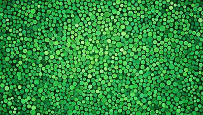 The primary subject of the image is a close-up of a green background, which appears to be a pattern or a texture. The setting or background is a green surface, possibly a wall or a fabric. The visual style of the image is a close-up, which emphasizes the green color and texture. The colors and mood of the image are predominantly green, creating a calm and soothing atmosphere.