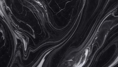 The primary subject of the image is a black and white marbled pattern, which appears to be a photograph of a marble surface. The setting is a dark background, which contrasts with the marbled pattern. The visual style is a close-up of the marbled pattern, showcasing its intricate details. The colors and mood of the image are predominantly dark, with the marbled pattern being the main focus and source of visual interest.