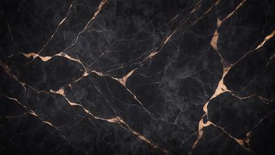 The primary subject of the image is a black marble countertop with a gold-colored pattern. The setting is a kitchen, and the visual style is a close-up of the marble countertop. The dominant colors are black and gold, creating a luxurious and elegant atmosphere.