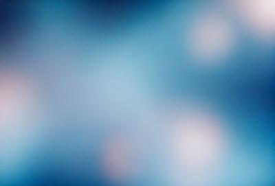 The primary subject of the image is a blue background with a pattern of white dots. The setting appears to be a space or an abstract environment. The visual style of the image is a combination of a photo and digital art, creating a unique and intriguing appearance. The dominant colors are blue and white, with the white dots adding a sense of depth and texture to the background. The overall atmosphere of the image is one of creativity and artistic expression.