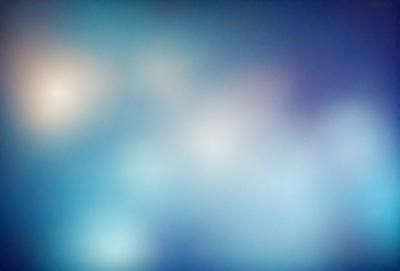 The primary subject of the image is a blue background with a pattern of white dots. The setting appears to be a dark room, and the visual style is a close-up of the blue background with the white dots. The colors and mood of the image are predominantly dark and moody, with the blue background providing a contrasting element.