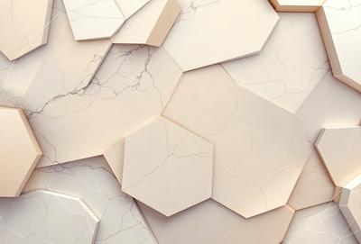 The primary subject of the image is a close-up of a marble wall with a pattern of hexagons. The setting is a room with a white marble wall, and the visual style is a photo. The dominant colors are white and beige, creating a clean and elegant atmosphere.