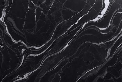 The primary subject of the image is a black and white marble pattern. The setting is a black background, which contrasts with the marble pattern. The visual style is a close-up of the marble pattern, showcasing its intricate details. The colors and mood of the image are predominantly black and white, giving it a classic and elegant appearance.