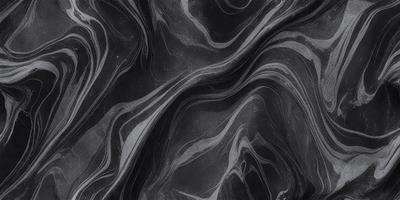 The image is a black and white photo of a marble-like pattern. The primary subject is the intricate design of the marble, which is the main focus of the image. The setting is a black background, which highlights the marble pattern. The visual style is a close-up of the marble pattern, showcasing its details. The colors and mood of the image are predominantly black and white, giving it a classic and timeless appearance.