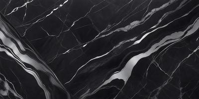The primary subject of the image is a black marble countertop. The setting is a kitchen, with the countertop being the main focus of the scene. The visual style is a close-up of the marble countertop, showcasing its texture and pattern. The colors and mood of the image are predominantly dark, with the black marble providing a striking contrast against the surrounding environment.