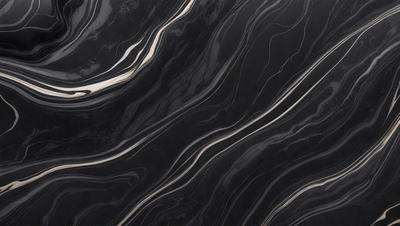 The primary subject of the image is a black and white marble pattern. The setting is a black background, which contrasts with the marble pattern. The visual style is a close-up of the marble pattern, showcasing its intricate details. The colors and mood of the image are predominantly black and white, giving it a classic and elegant appearance.