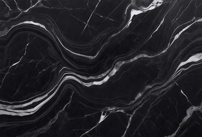 The primary subject of the image is a black and white marble pattern. The setting is a black marble surface, which serves as the background. The visual style is a close-up of the marble pattern, showcasing its intricate details. The colors and mood of the image are predominantly black and white, giving it a classic and elegant appearance.