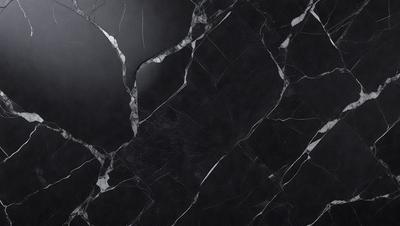 The primary subject of the image is a black marble countertop. The setting is a dark room, and the visual style is a close-up of the marble countertop. The countertop has a patterned texture, and the colors are predominantly black. The overall atmosphere of the image is dark and moody.