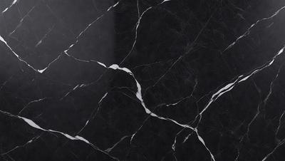 The primary subject of the image is a black marble countertop with white veins. The setting is a kitchen, and the visual style is a close-up of the marble countertop. The dominant colors are black and white, creating a sleek and elegant atmosphere.
