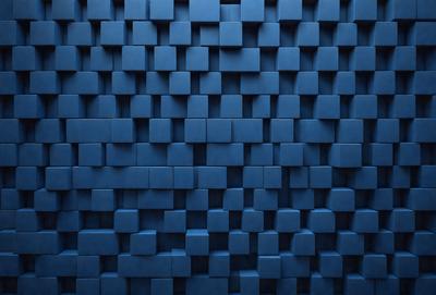 The primary subject of the image is a blue wall with a pattern of blue squares. The setting is a room with a blue wall, and the visual style is a photo. The dominant colors and overall atmosphere are blue and calm.