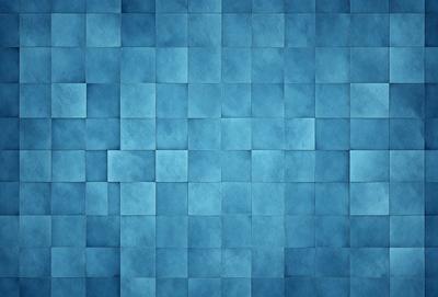 The primary subject of the image is a blue tile wall. The setting is a room with a blue tile floor. The visual style is a patterned blue tile wall, which gives the room a modern and stylish appearance. The dominant colors are blue and white, creating a calm and soothing atmosphere.