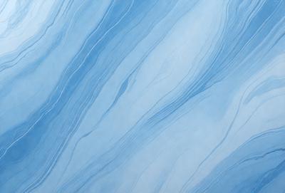 The primary subject of the image is a blue and white patterned wall. The setting is a room with a blue and white tiled wall. The visual style is a photo of the blue and white tiled wall. The dominant colors are blue and white, creating a calm and soothing atmosphere.