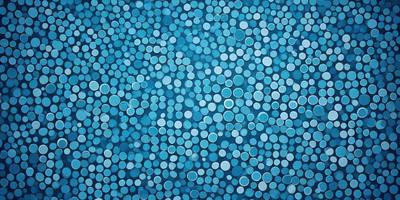 The primary subject of the image is a blue background with a pattern of white circles. The setting appears to be a blue sky, and the visual style is a combination of a photo and a digital artwork. The dominant colors are blue and white, creating a calm and serene atmosphere.