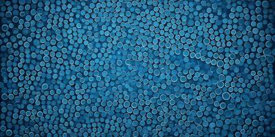 The primary subject of the image is a blue background with a pattern of blue circles. The setting is a blue sky, and the visual style is a digital art or illustration. The dominant colors are blue, and the overall atmosphere is calm and serene.