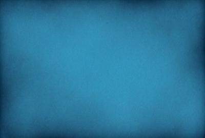 The primary subject of the image is a blue background. The setting is a dark blue sky, and the visual style is a photo. The colors and mood of the image are predominantly dark and moody, with the blue background creating a sense of depth and calmness.