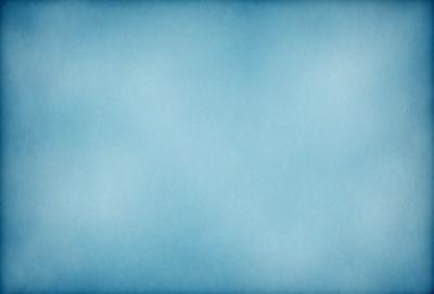 The primary subject of the image is a blue sky with clouds. The setting is a clear day with a cloudy sky, and the visual style is a natural, outdoor atmosphere. The colors and mood are predominantly blue, with a hint of white from the clouds, creating a serene and peaceful ambiance.