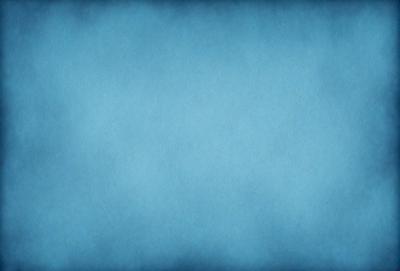 The primary subject of the image is a blue background. The setting is a large, empty space with no visible objects or people. The visual style is a close-up of the blue background, which gives a sense of depth and focus to the image. The colors and mood are predominantly blue, creating a calm and serene atmosphere.