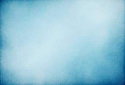 The primary subject of the image is a blue sky with clouds. The setting is a cloudy day, and the visual style is a photo. The dominant colors are blue and white, creating a calm and serene atmosphere.