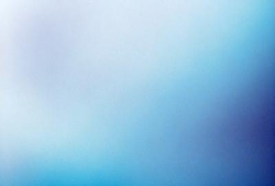 The primary subject of the image is a large, open, and cloudy sky. The setting is a vast, empty space with no visible landmarks or objects. The visual style is a natural, outdoor scene with a focus on the sky. The colors and mood of the image are predominantly blue, creating a calm and serene atmosphere.