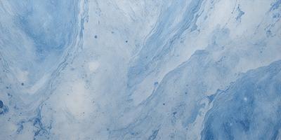 The primary subject of the image is a blue and white marbled surface, which appears to be a tile or a wall with a patterned design. The setting is a room with a blue and white color scheme, creating a calm and soothing atmosphere. The visual style of the image is a close-up of the marbled surface, showcasing its intricate pattern and texture. The colors and mood of the image are predominantly blue and white, giving it a clean and elegant appearance.