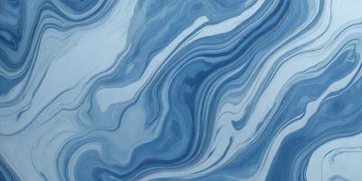 The primary subject of the image is a blue and white ocean wave. The setting is the ocean, with the wave crashing against the surface. The visual style is a photo of the ocean, capturing the beauty and power of the wave. The dominant colors are blue and white, creating a serene and calming atmosphere.