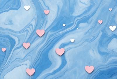 The primary subject of the image is a collection of hearts floating in a blue, swirling ocean. The hearts are scattered throughout the scene, with some closer to the foreground and others further away. The setting is a vast, open ocean, and the visual style is a combination of photo and digital art. The dominant colors are blue and pink, creating a serene and calming atmosphere.