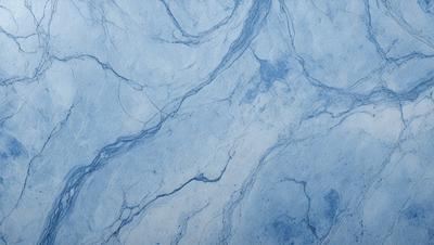 The primary subject of the image is a blue marble tile with a pattern of swirls and lines. The setting is a bathroom, as indicated by the presence of the blue marble tile. The visual style is a close-up of the tile, showcasing its intricate design. The colors and mood of the image are predominantly blue, creating a calm and serene atmosphere.