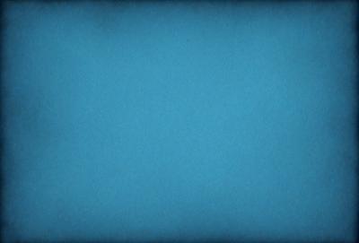 The primary subject of the image is a blue background. The setting is a dark blue sky, and the visual style is a photo. The colors and mood of the image are predominantly dark and moody, with the blue background creating a sense of depth and calmness.