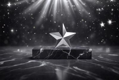 The primary subject of the image is a silver star, which is the main object, scene, or focus of the image. The setting/background features a black and white marble surface, which adds a sense of elegance and sophistication to the scene. The visual style of the image is a combination of photo and digital art, creating a unique and eye-catching presentation. The colors and mood of the image are predominantly black and white, giving it a classic and timeless feel.