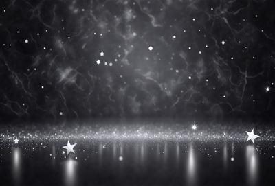 The primary subject of the image is a star, which is the main object in the scene. The setting is a black background, which creates a contrast with the star. The visual style is a black and white photo, giving the image a classic and timeless appearance. The colors and mood of the image are predominantly dark, with the star being the only bright and prominent element in the scene.