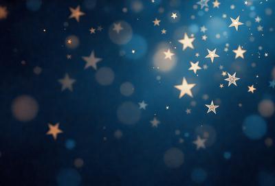 The primary subject of the image is a blue background with a multitude of white stars scattered throughout. The setting appears to be a night sky, with the stars creating a sense of depth and a serene atmosphere. The visual style of the image is a combination of a photo and digital art, as the stars are depicted in a way that resembles a painting or drawing. The colors and mood of the image are predominantly blue and white, with the white stars creating a sense of calmness and tranquility.