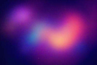 The primary subject of the image is a purple and orange swirl pattern. The setting is a dark background, which contrasts with the vibrant colors of the swirl pattern. The visual style appears to be a digital art or illustration, as the swirl pattern is created with a combination of purple and orange colors. The overall atmosphere of the image is dynamic and visually appealing.