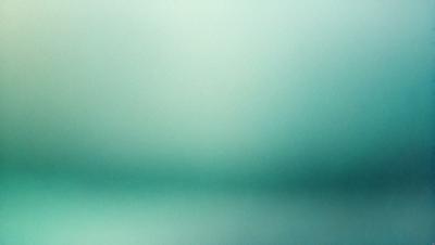 The primary subject of the image is a green background, which appears to be a wall or a surface. The setting or background is a green environment, which could be a wall or a surface. The visual style of the image is a photo, as it captures a real-life scene. The colors and mood of the image are predominantly green, creating a calm and serene atmosphere.