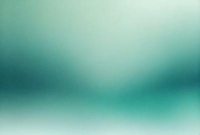 The primary subject of the image is a green background, which appears to be a wall or a surface. The setting is a room with a green color scheme. The visual style is a close-up of the green background, which gives the image a clean and minimalist appearance. The colors and mood of the image are predominantly green, creating a calm and soothing atmosphere.