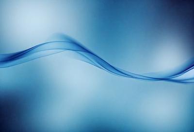 The primary subject of the image is a blue wave or ripple pattern. The setting is a blue background, which creates a visually appealing contrast with the wave. The visual style is a digital art or illustration, as the wave appears to be a digital creation. The dominant colors are blue and white, giving the image a calm and serene atmosphere.